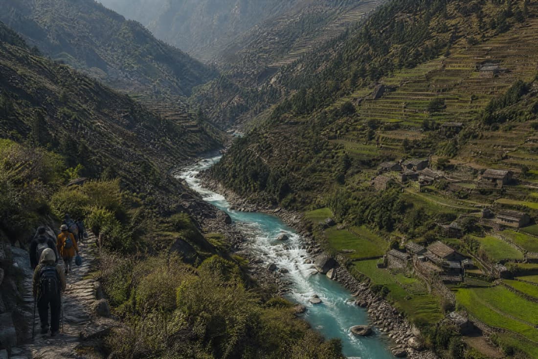 An aerial view of a terraced Himalayan valley
